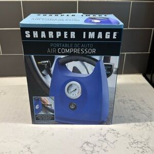 Sharper Image Portable DC Air Compressor with built in gauge for cars bicycles